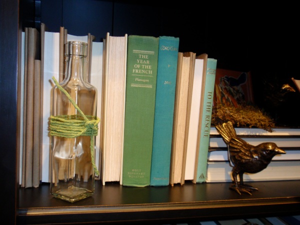 vase on bookshelf