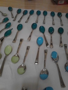 painted spoons drying